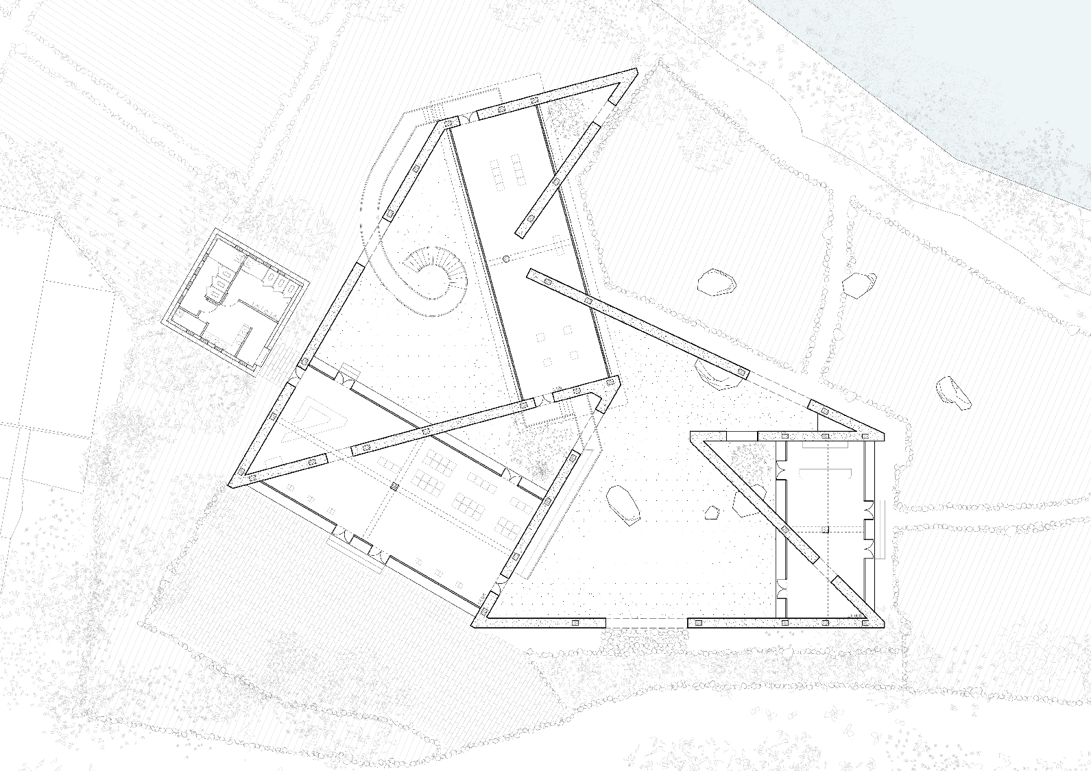 Overall plan of the rammed-earth Visitor Center by OfficeOffCourse, shown as context for the interior detailing and display work.