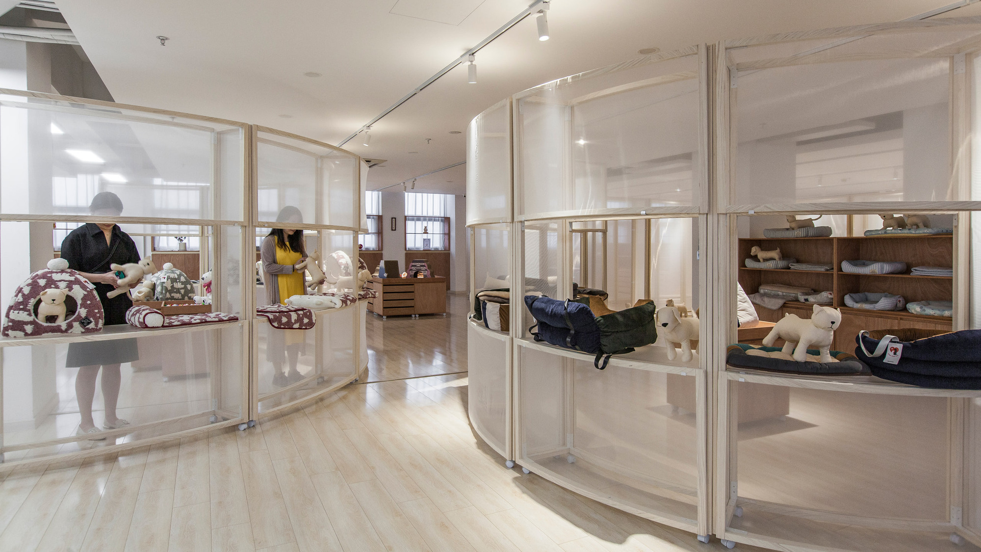 Movable partitions and cabinets organize the completed showroom display.
