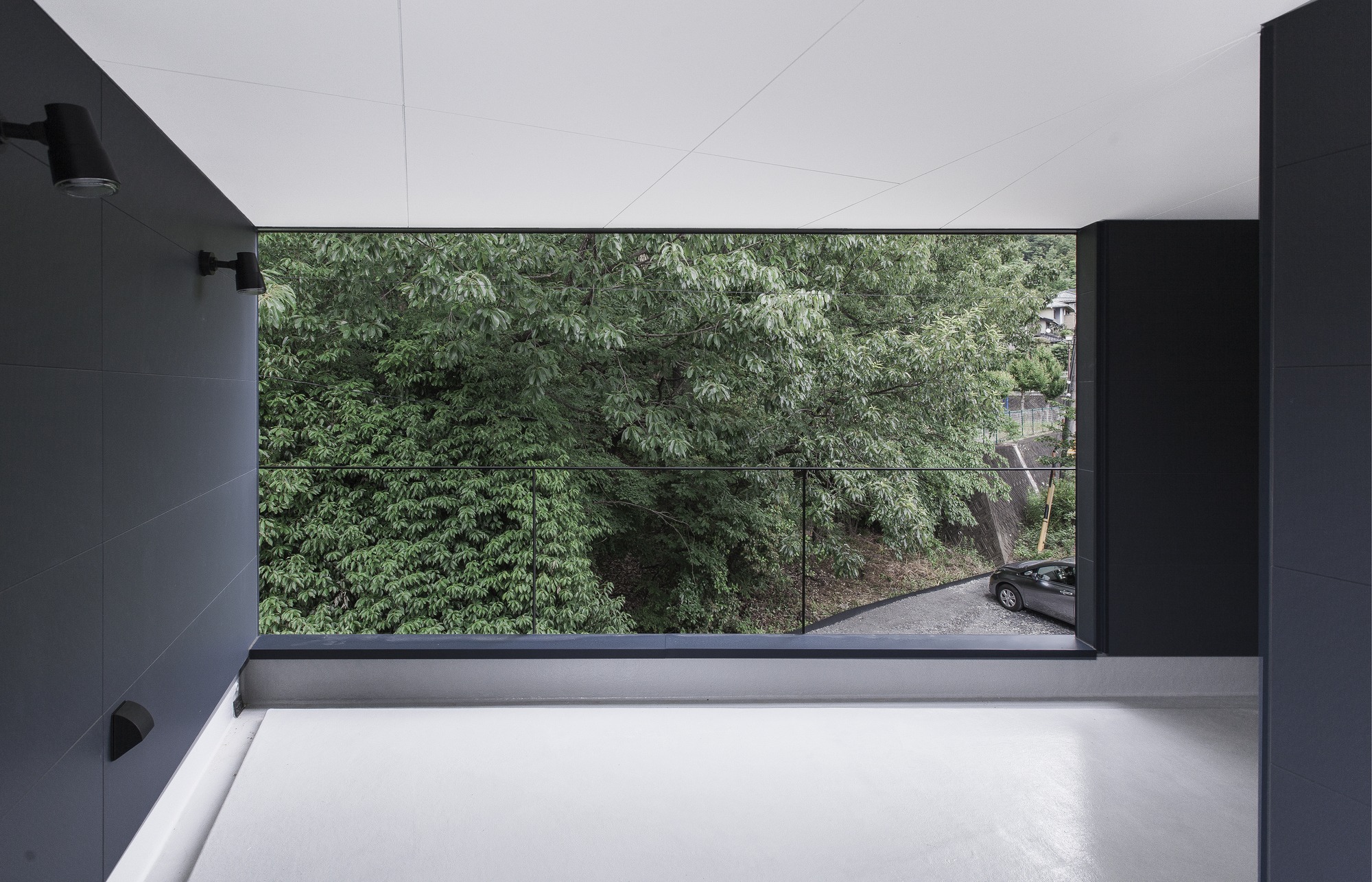 Completed terrace framing the surrounding greenery